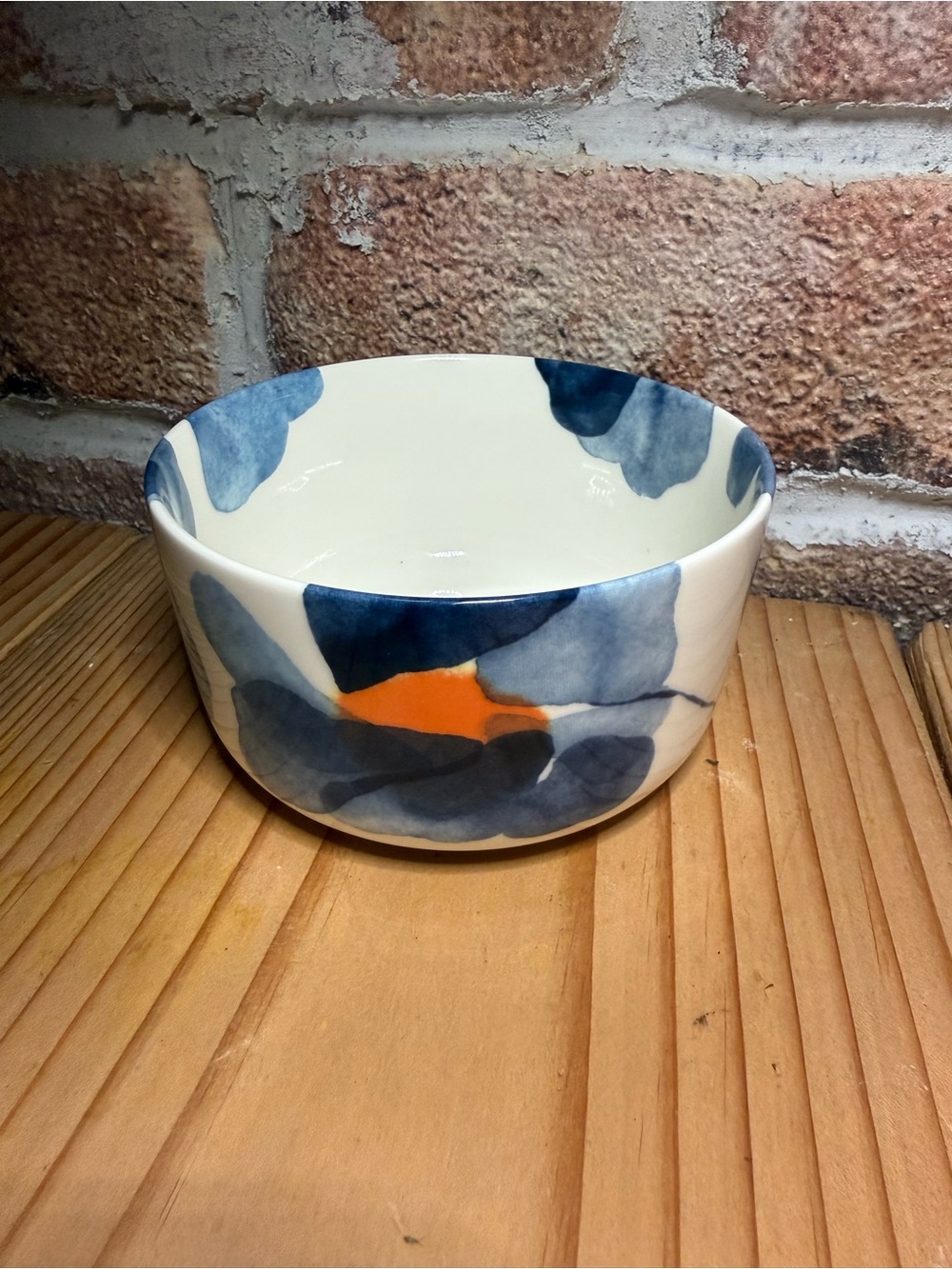 Marimekko Valssi Ceramic Bowl with Blue and Orange Floral Motif
